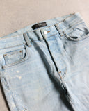 Amiri Bleach Stained Distressed Skinny Denim Jeans