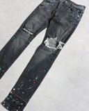 Amiri Paint Splatter Distressed Skinny Denim Jeans